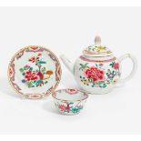 TEA POT, CUP AND SAUCER WITH FLOWER DECORATION.