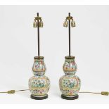 PAIR OF VASES MOUNTED AS LAMPS.