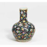 LARGE BELLY VASE WITH MILLEFLEUR DECOR.