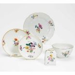 PORCELAIN BOWL, TEA CADDY, SMALL DISH AND TWO PLATES WITH FLOWER DECOR.