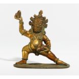 RARE DEPICTION OF THE BLACK JAMBHALA. Origin: Tibet. Date: 19th c. Technique: Fire gild bronze.