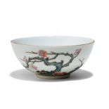 SMALL BOWL WITH FLOWERING PLUM TREES. Origin: China. Technique: Porcelain finely painted in