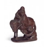 NETSUKE: KÔSEKIKÔ ON MULE AND CHÔRYÔ GIVING HIM BACK HIS LOST SHOE. Origin: Japan. Date: 19th c.