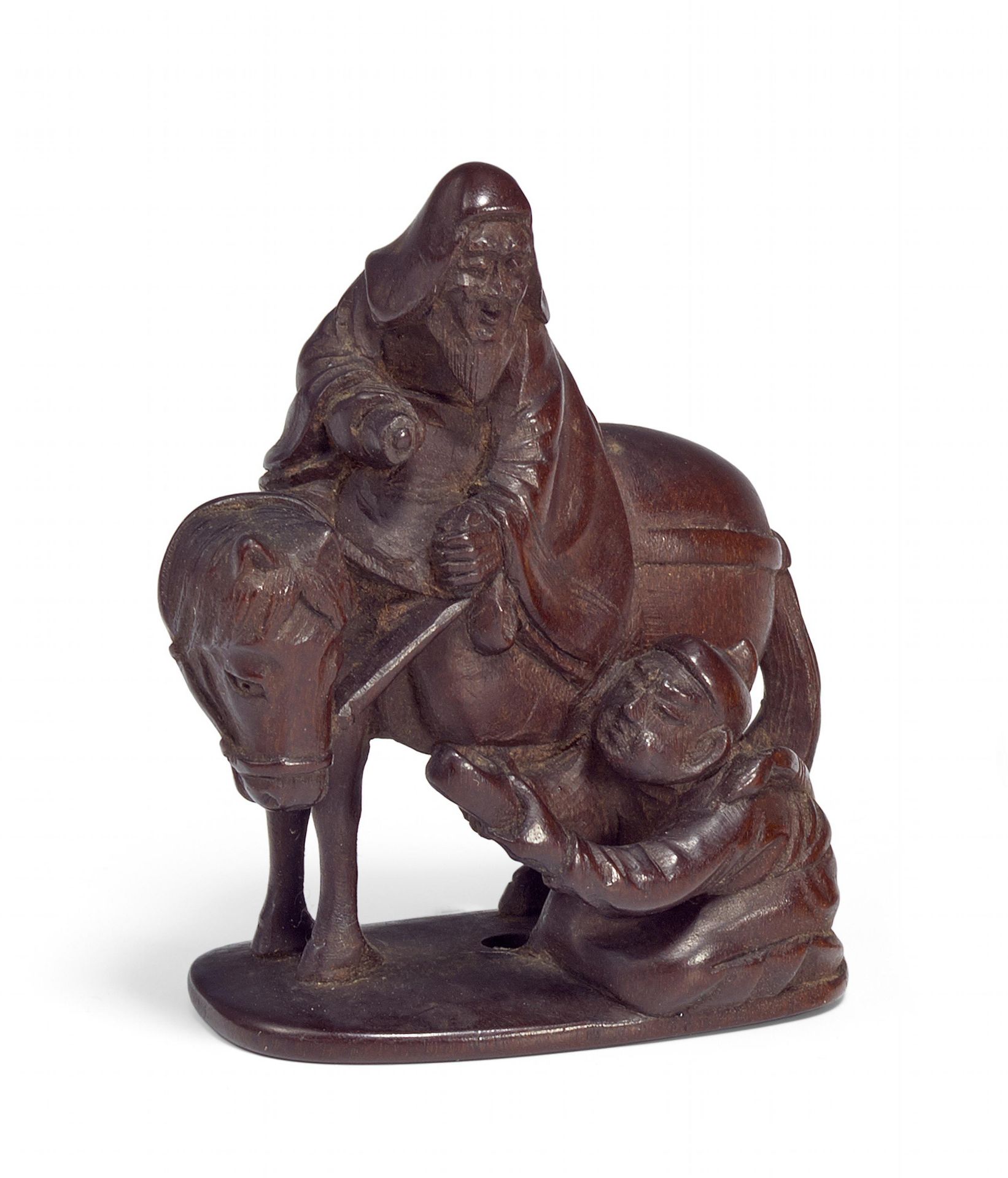 NETSUKE: KÔSEKIKÔ ON MULE AND CHÔRYÔ GIVING HIM BACK HIS LOST SHOE. Origin: Japan. Date: 19th c.