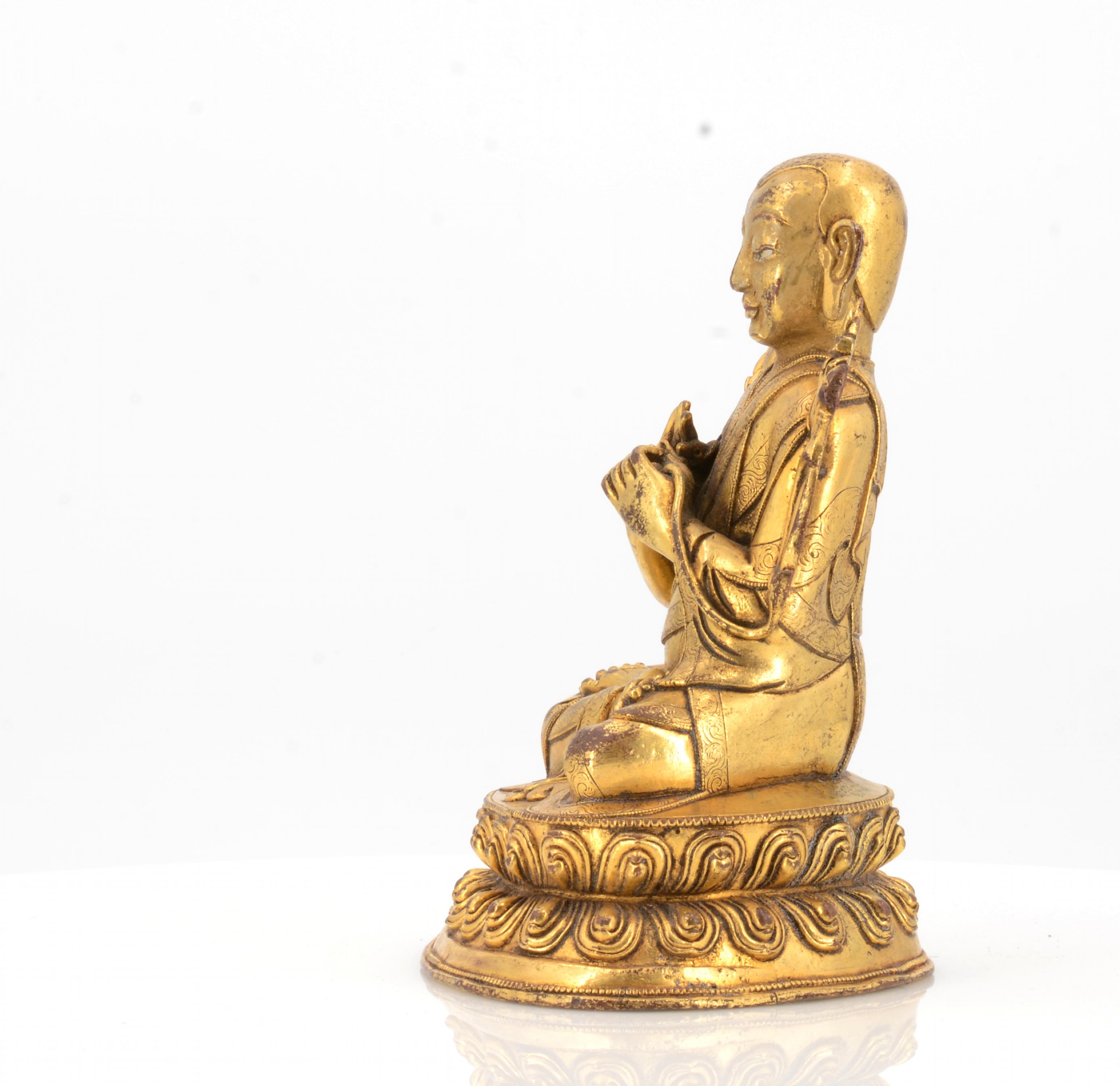 LAMA WITH HIS HANDS IN TEACHING GESTURE. Origin: Tibet. Date: 17th-18th c. Technique: Fire gilt - Image 3 of 6