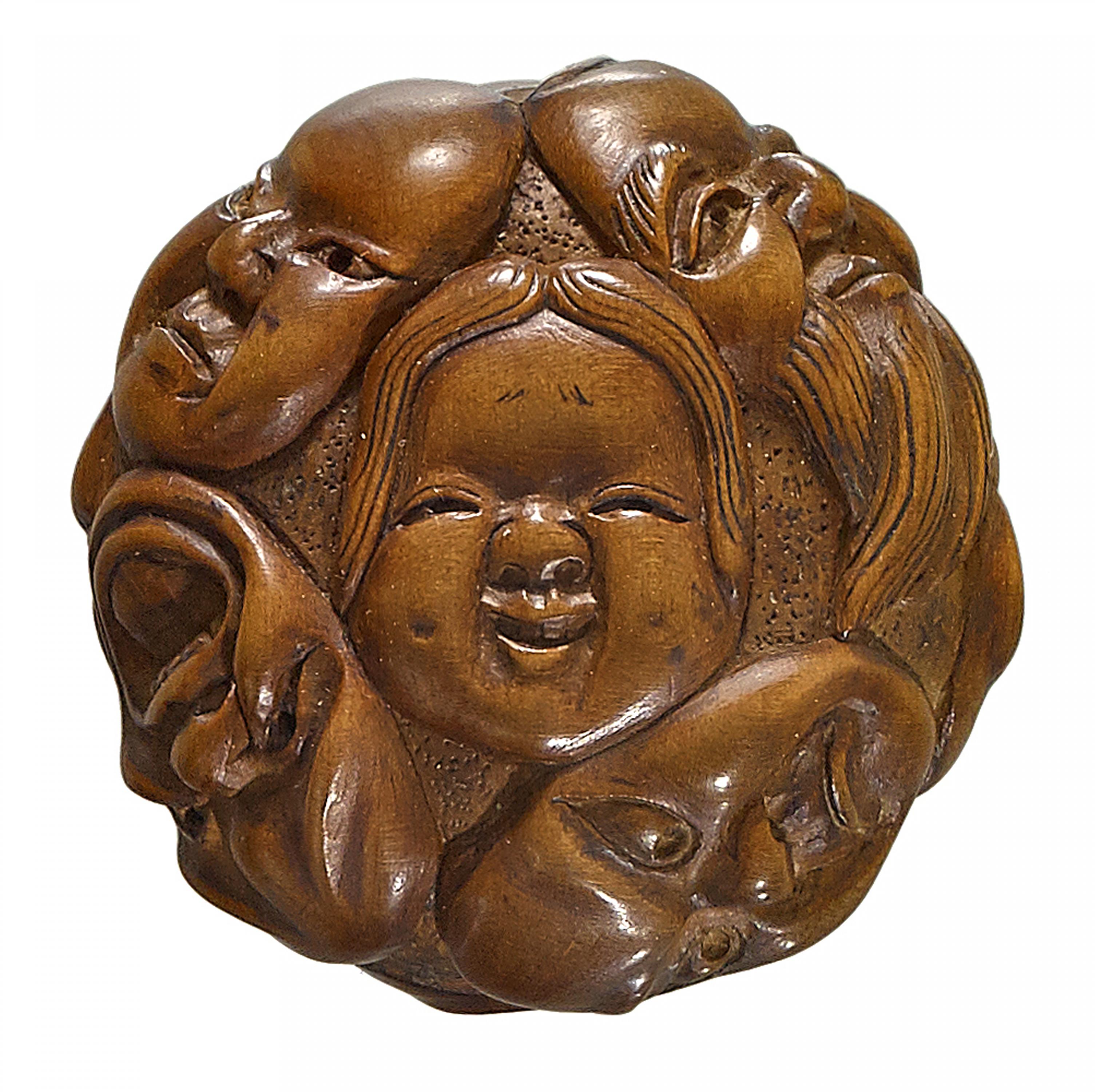 NETSUKE: GROUP OF NINE MASKS. Origin: Japan. Date: 19th c. Technique: Boxwood. Measurement: Height