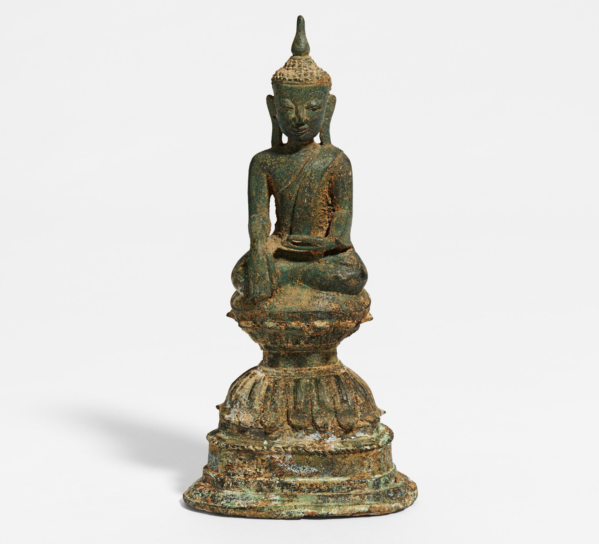 BUDDHA MARAVIJAYA ON HIGH LOTUS BASE. Origin: Burma/Myanmar. Date: 17th c. Technique: Bronze with