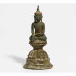 BUDDHA MARAVIJAYA ON HIGH LOTUS BASE. Origin: Burma/Myanmar. Date: 17th c. Technique: Bronze with