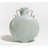 MOON FLASK WITH RUYI HANDLES. Origin: China. Date: 19th-20th c. Technique: Porcelain with light blue