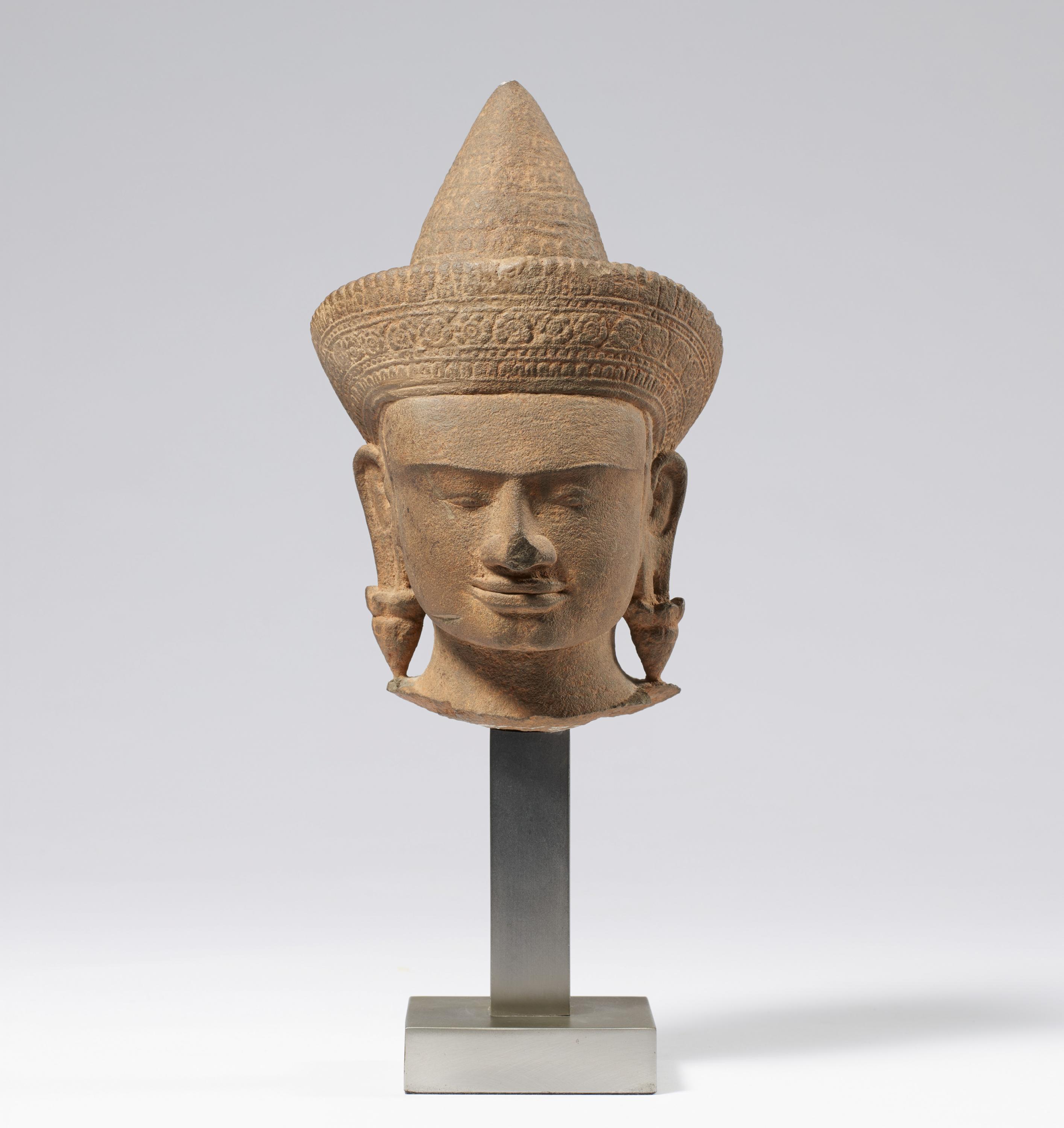 HEAD OF A CROWNED GODDESS. Origin: Khmer. Dynasty: Angkor Wat period (1100-1175). Date: 12th c. - Image 2 of 5