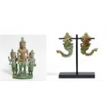 SMALL TRIAD VOTIVE FIGURE OF SHIVA AND A PAIR OF PALANQUIN HOOKS WITH GARUDA. Origin: Khmer.