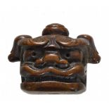 NETSUKE: LION MASK. Origin: Japan. Dynasty: Edo period. Date: 18th c. Technique: Dark wood.