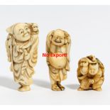 THREE NETSUKE: SARUMAWASHI, HOTEI AND ENSHI. Origin: Japan. Date: 19th c. Technique: Ivory resp.