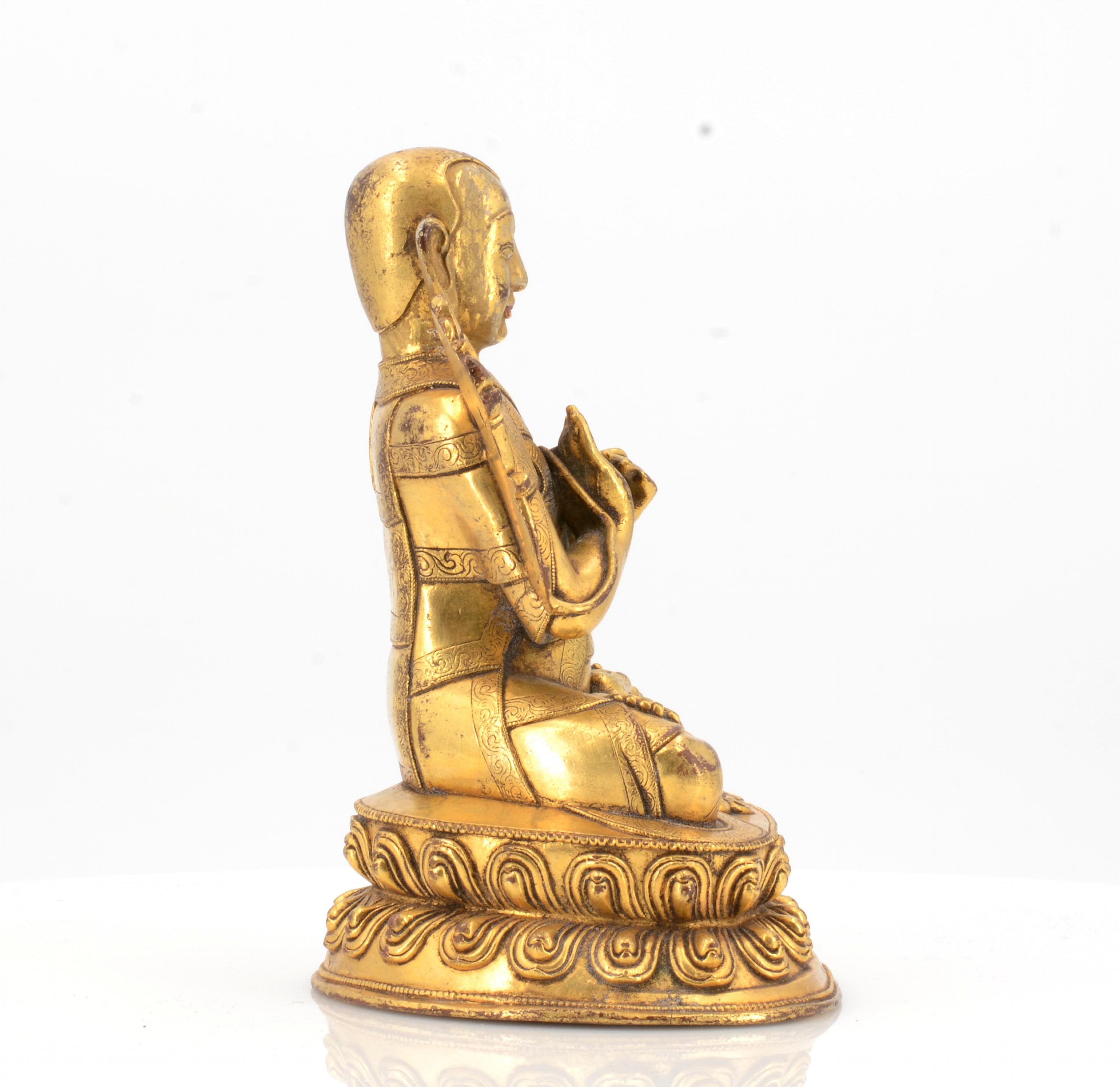 LAMA WITH HIS HANDS IN TEACHING GESTURE. Origin: Tibet. Date: 17th-18th c. Technique: Fire gilt - Image 5 of 6