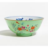 LIME GREEN BOWL WITH FLOWERS OF THE FOUR SEASONS. Origin: China. Technique: Porcelain, painted