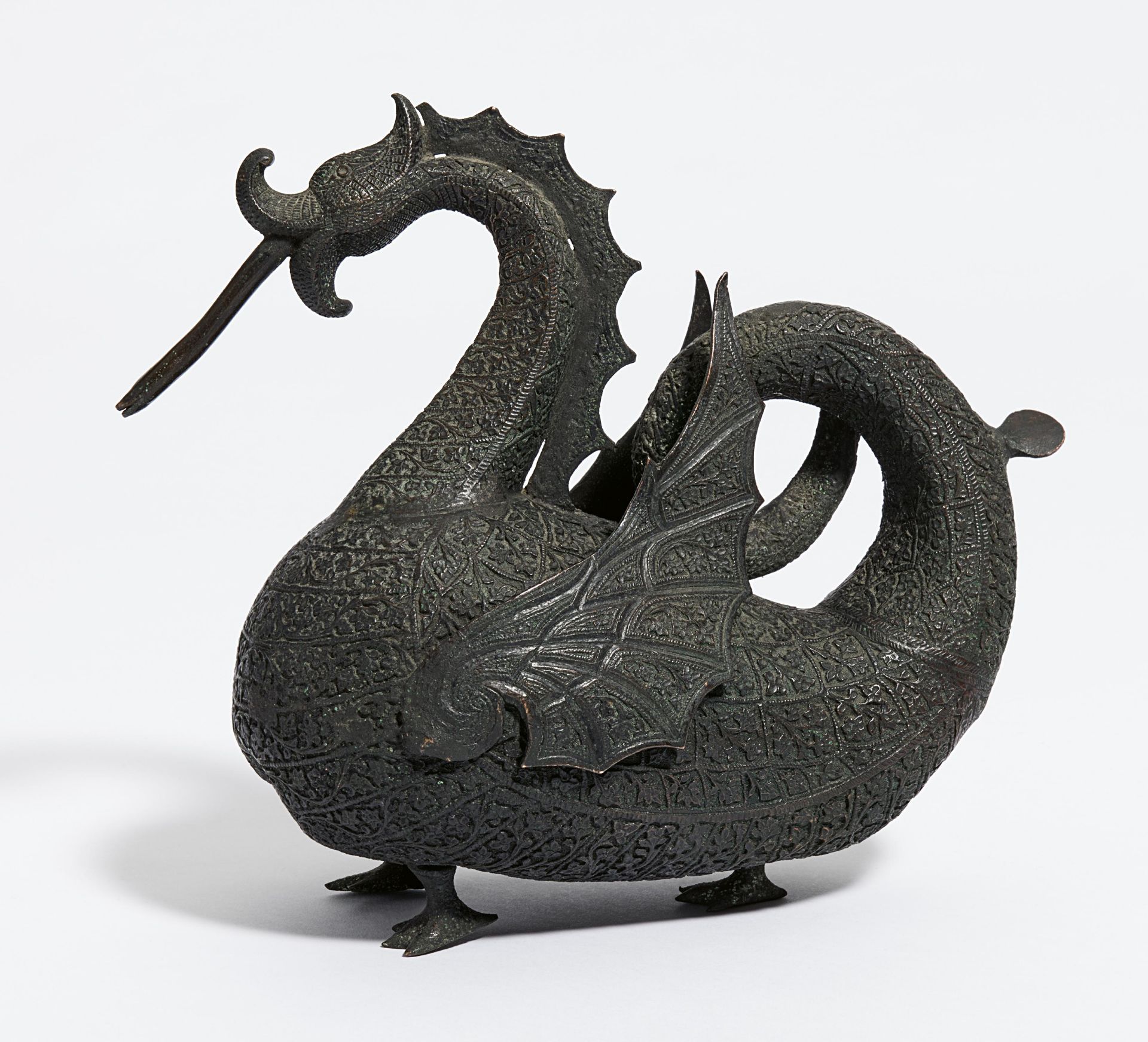 AQUAMANILE IN DRAGON SHAPE WITH WINGS AND ON THREE FEET. Origin: Mughal India. Date: 19th-beg.