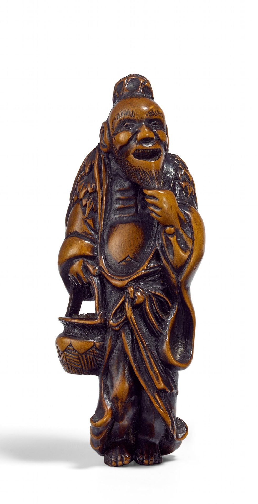 NETSUKE: SENNIN WITH BASKET. Origin: Japan. Dynasty: Edo period. Date: 18th/19th c. Technique: