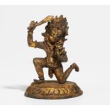 SMALL FIGURE OF ACHALA WITH THE SWORD OF WISDOM. Origin: Tibet. Date: 19th c. Technique: Old fire