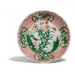 IMPORTANT AND RARE DISH WITH LILIES AND SINGING BIRD. Origin: China. Dynasty: Qing dynasty. Kangxi