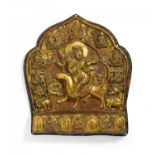 IMPORTANT RELIEF WITH FEMALE DEITY RIDING ON A WOLF. Origin: Tibet. Date: 18th c. Technique: