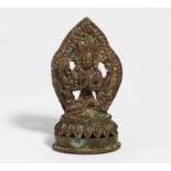 THE FOUR-ARMED AND CROWNED CHENREZIG WITH FLAMING AUREOLE. Origin: Nepal. Technique: Copper bronze