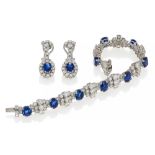 SAPPHIRE-DIAMOND-SET: BRACELET AND EAR CLIP-ONS. Origin: Germany. Date: 1980s. Material: Bracelet