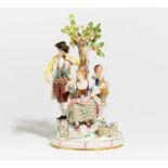 PORCELAIN GROUP OF GARDENERS UNDER AN APPLE TREE. Meissen. Maker/Designer: Model M.V. Acier.