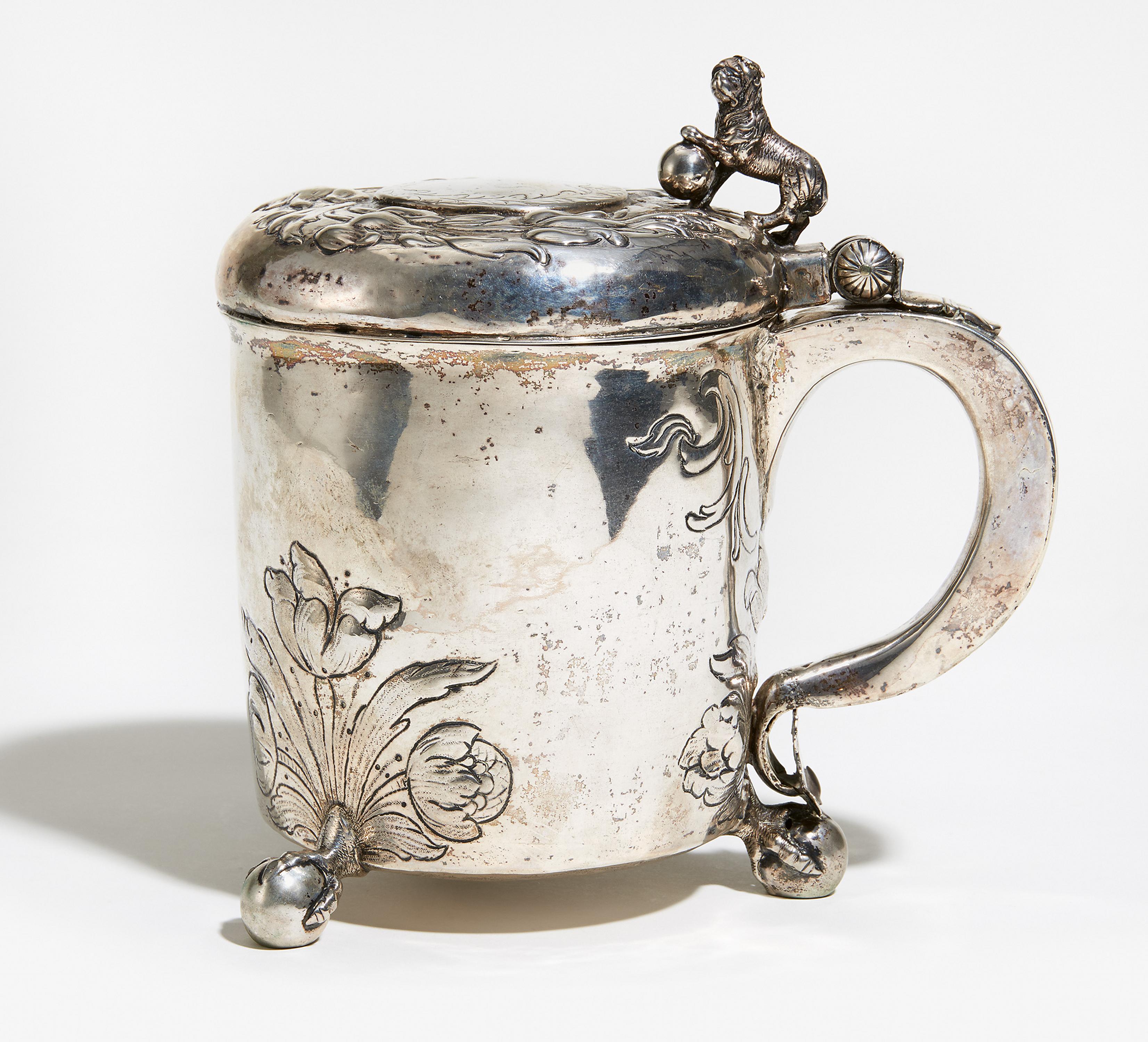 LARGE SILVER TANKARD WITH GILT INTERIOR AND BALL FEET. Presumably North Europe. Date: 18th