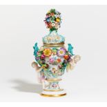 SMALL PORCELAIN POTPOURRI VASE WITH CUPIDS. Meissen. Date: 19th century. Maker/Designer: Model J.