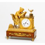 GILT BRONZE PENDULUM CLOCK "READING WOMAN". Paris. Date: Around 1810. Maker/Designer: The movement