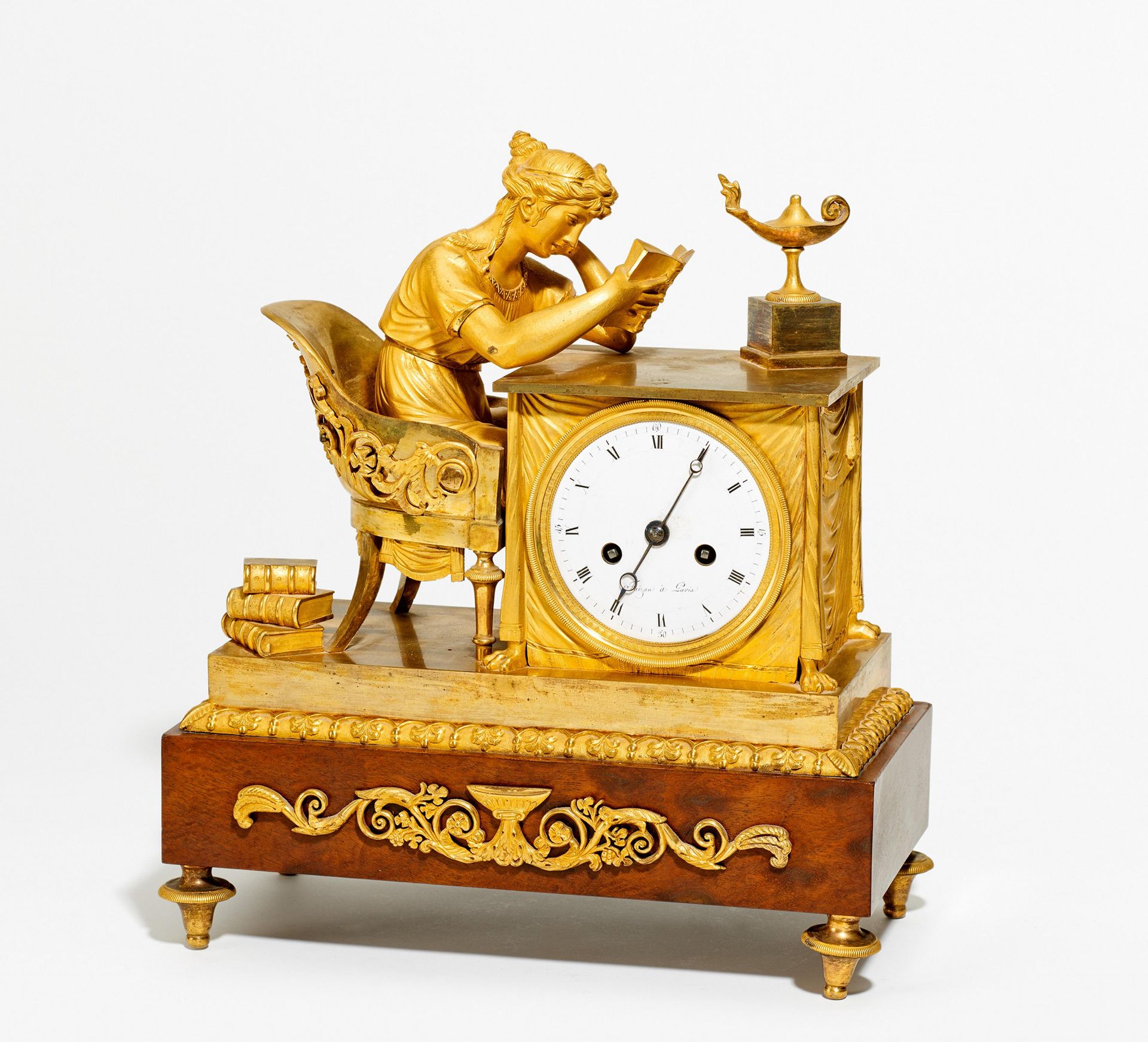 GILT BRONZE PENDULUM CLOCK "READING WOMAN". Paris. Date: Around 1810. Maker/Designer: The movement