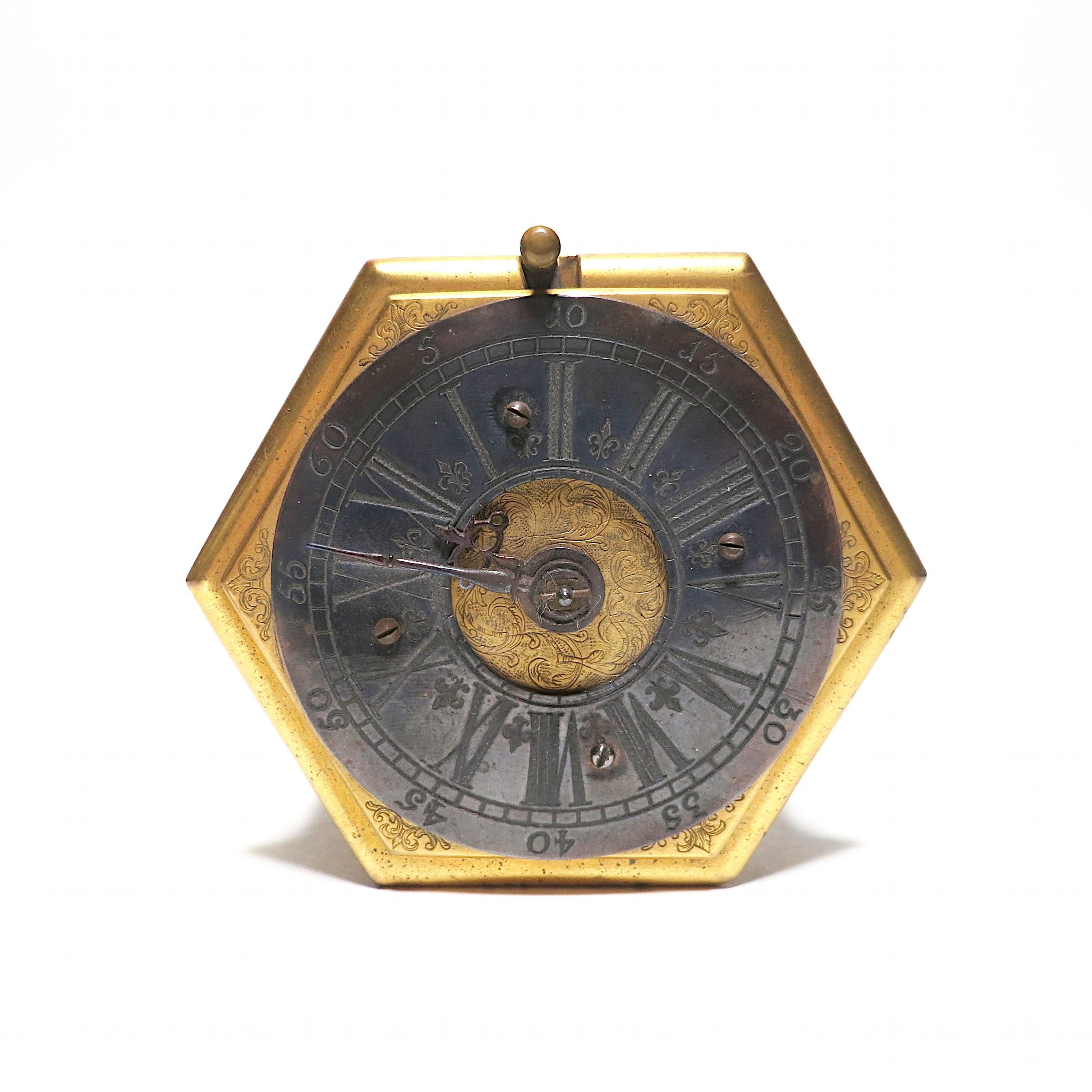 HEXAGONAL BAROQUE TABLE CLOCK MADE OF GILT BRONZE WITH RESIDUES OF SILVER PLATING AND GLASS. - Image 9 of 10