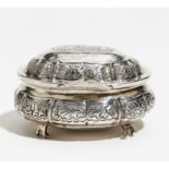 SILVER SUGAR BOX WITH ROCAILLE DECOR AND RESIDUES OF GILDING. St. Petersburg. Date: 1759. Maker/