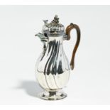 LARGE, PARTIALLY GILT SILVER HOT CHOCOLATE POT WITH WOODEN HANDLE. Augsburg. Date: 1771-1773.