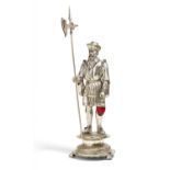 LARGE HISTORISM FIGURINE OF A NIGHT WATCHMAN WITH HALBERD MADE OF SILVER AND RED GLASS. Hanau. Date: