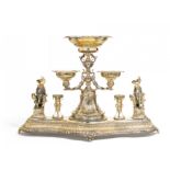 MONUMENTAL, PARTLY GILT SILVER CENTREPIECE WITH BACCHANTS MAKING MUSIC. Presumably Germany. Date: