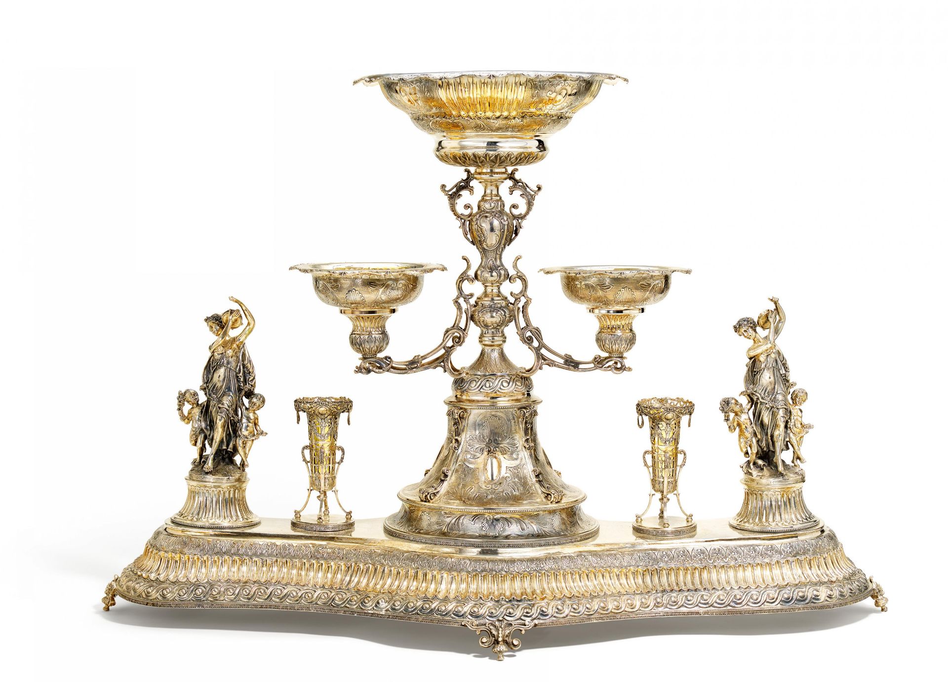 MONUMENTAL, PARTLY GILT SILVER CENTREPIECE WITH BACCHANTS MAKING MUSIC. Presumably Germany. Date: