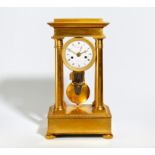 EMPIRE PORTAL PENDULUM CLOCK MADE OF GILT BRONZE. Paris. Date: Around 1810. Maker/Designer: