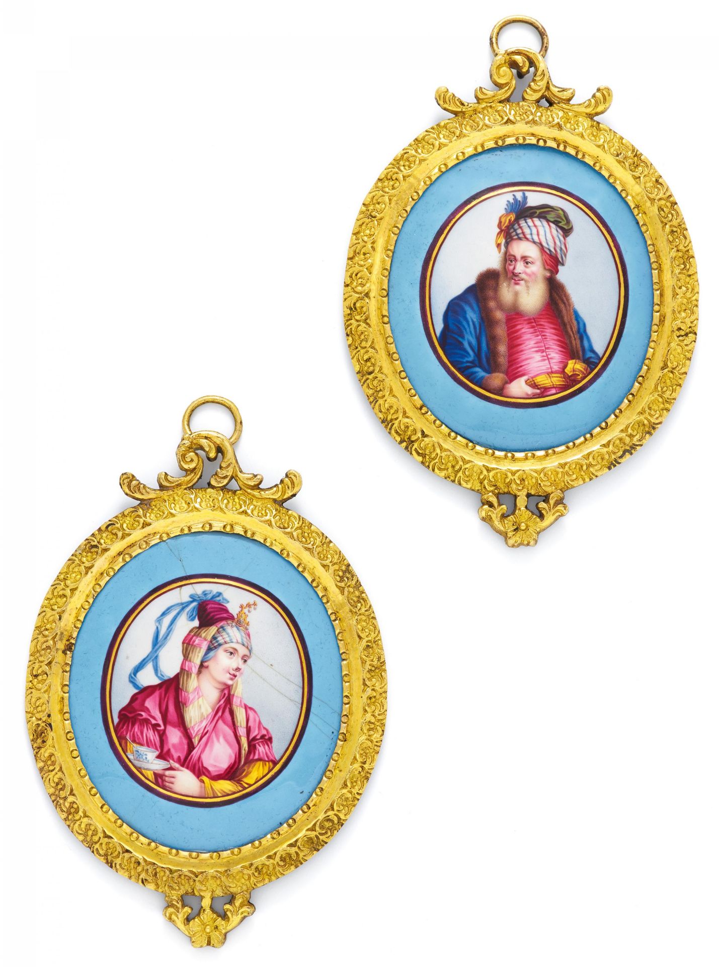 PAIR OF EXTRAORDINARY ENAMEL MINIATURES ON COPPER WITH ORIENTAL COUPLE IN BRASS FRAMES. Germany.