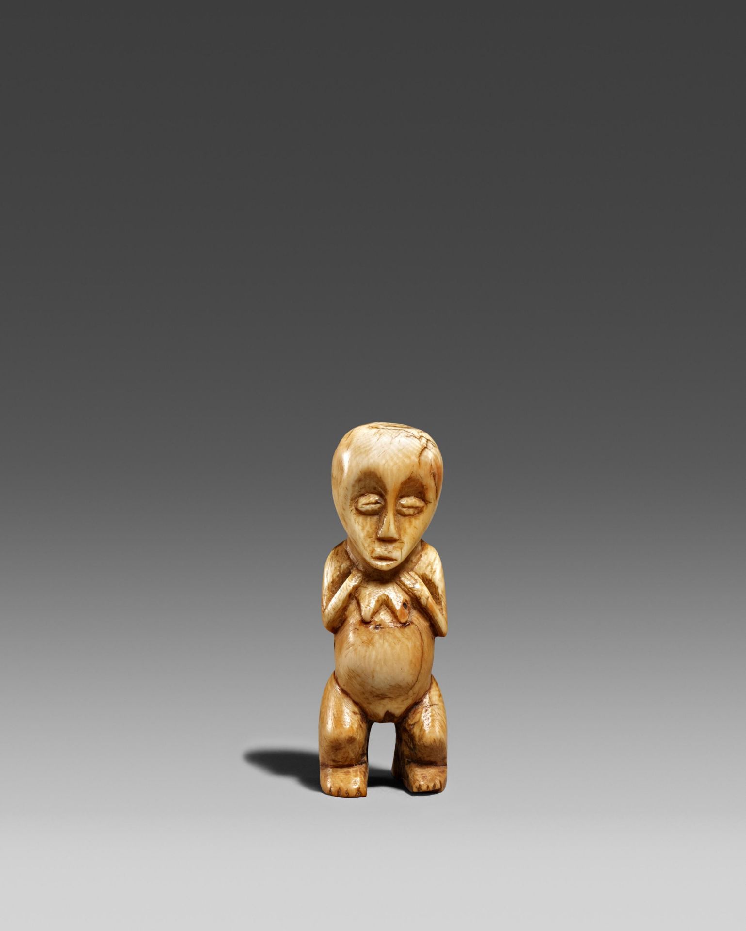 LUBA, Democratic Republic of the Congo. Amulet (in the shape of a female figure). Ivory. 9,5 x 3,5 x