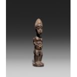 BAULE, Ivory Coast. Male figure. Wood, dark patina. 32 x 7 x 8cm. Provenance:- Ludwig Bretschneider,