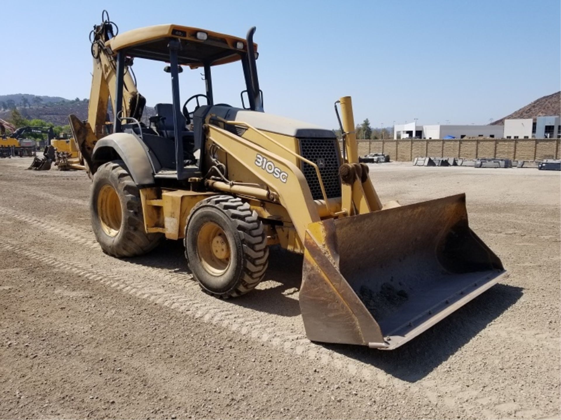 2006 John Deere 310SG Backhoe,