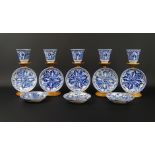 4 blauw/wit Chinees porseleinen kopjes en 8 schotels met decor van lijzen in vakverdeling, 19e eeuw