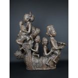 terracotta sculptuur met voorstelling van figuren en haan op karbouw, Indonesië, h. 64 cm<