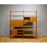 Deense design teakhouten boekenkast met 3 bergvakken en 9 planken, h.184,  br. 168, d. 36<br