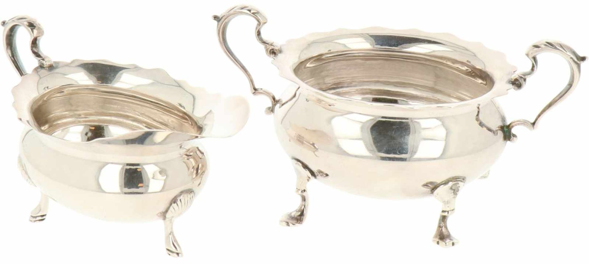 (2) Piece silver set of creamers.