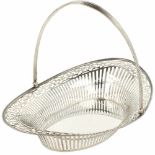 Bread basket with silver swing handle.