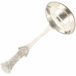 Silver sauce spoon.