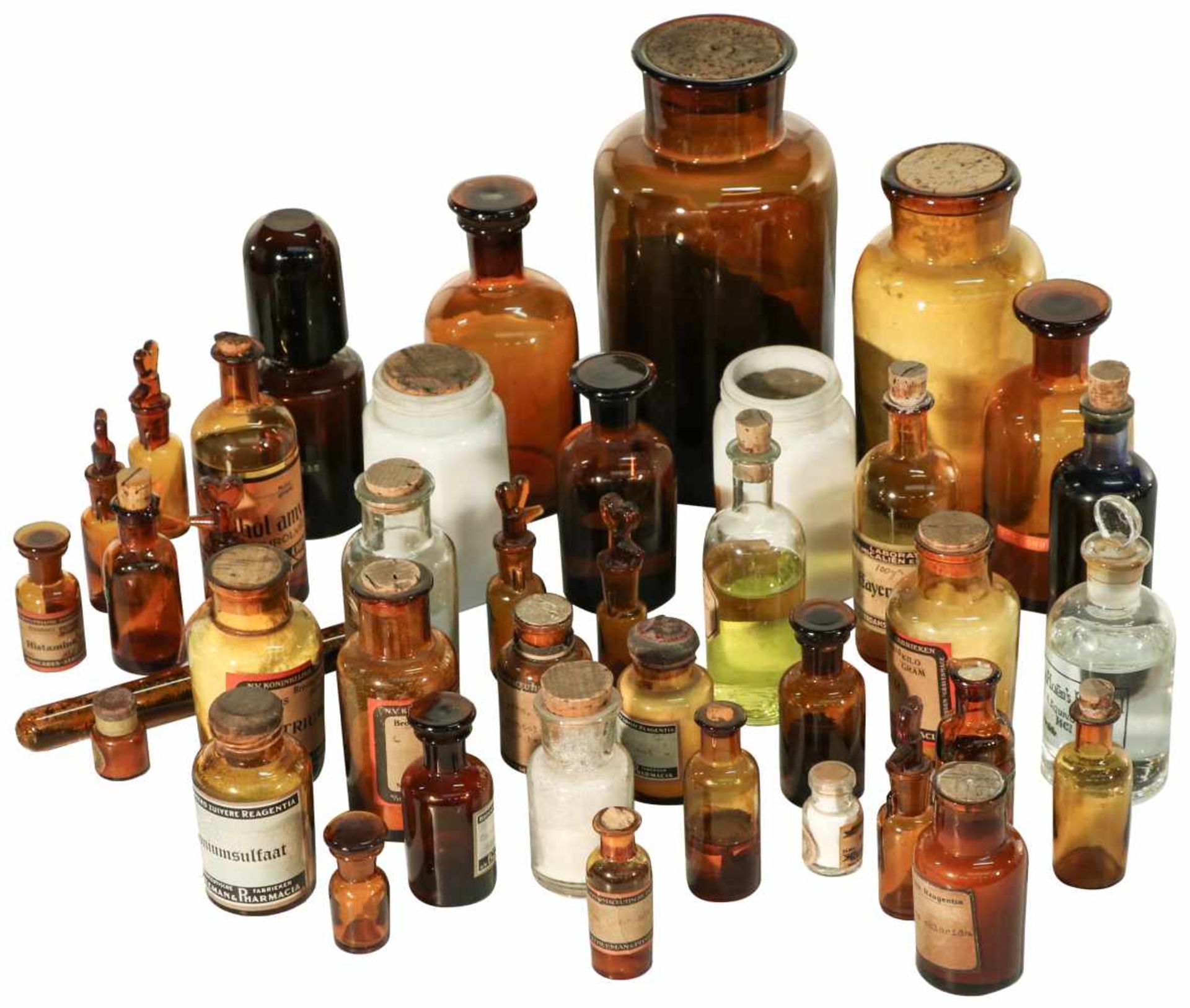 A large collection of pharmacy jars.