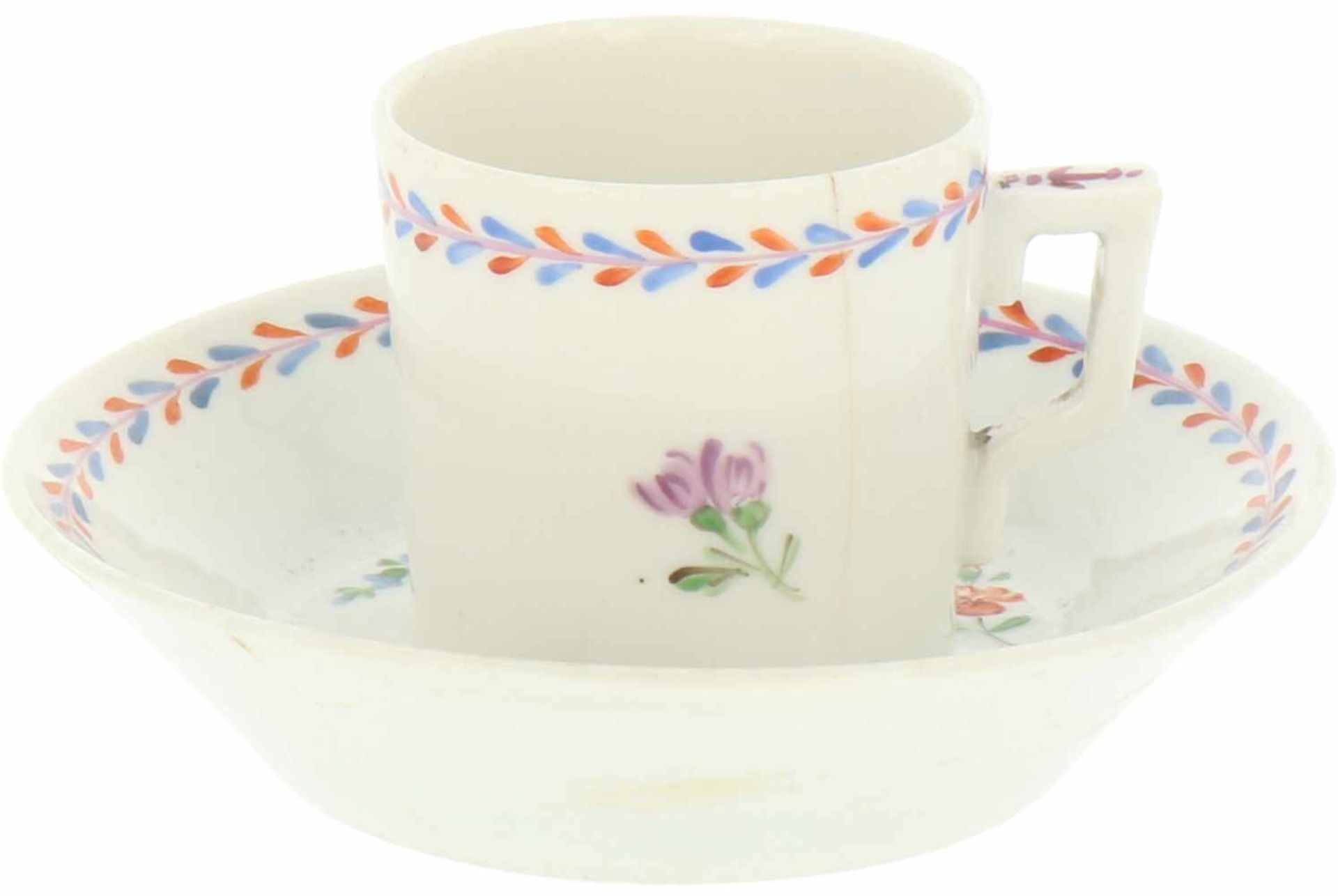 A porcelain cup and saucer. 19th century.